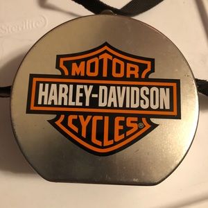 Harley Davidson collectors tin “purse”.